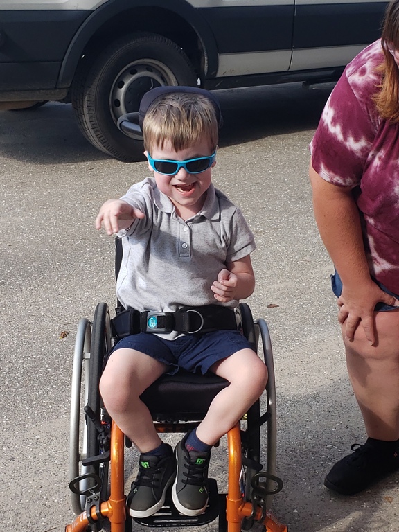 Happy Child in Wheelchair